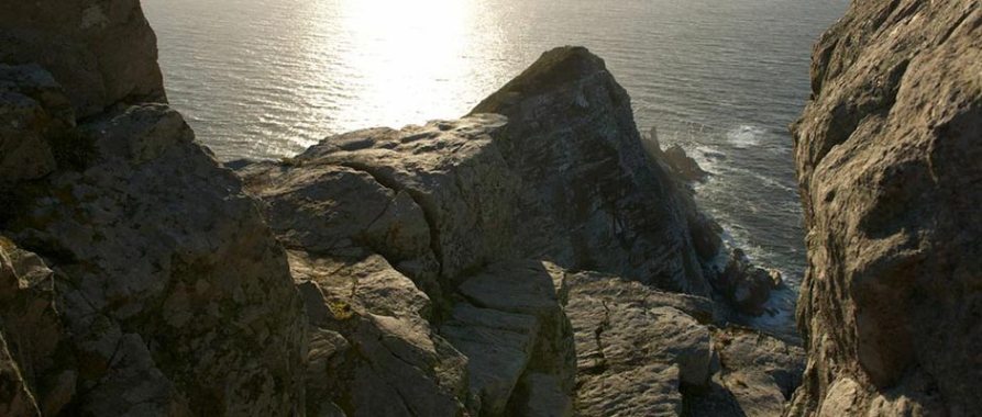 The intimidating, rocky outcrops of the Cape of Good Hope. Source.